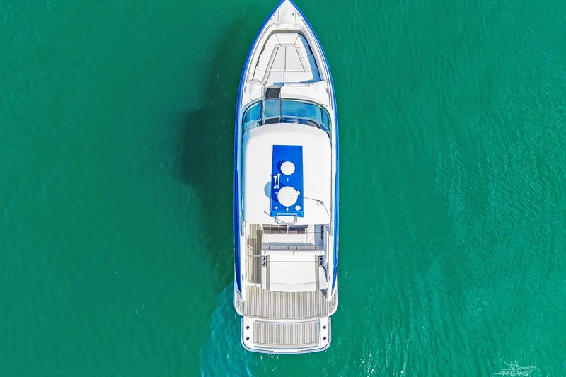 Slide: The Image of Overhead view of 2018 Formula 350 FX Crossover Bowrider on turquoise water. - 3