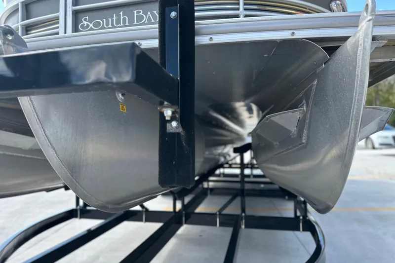 Slide: The Image of 2011 South Bay 925 CR pontoon boat underside on trailer. - 10