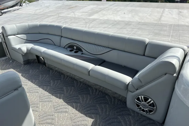 Slide: The Image of Luxurious seating on 2011 South Bay 925 CR pontoon boat with cup holders and speaker. - 19