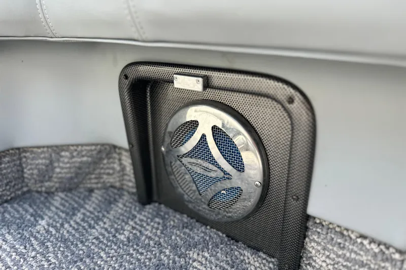 Slide: The Image of Speaker detail in 2011 South Bay 925 CR boat interior with gray upholstery and carpet. - 20