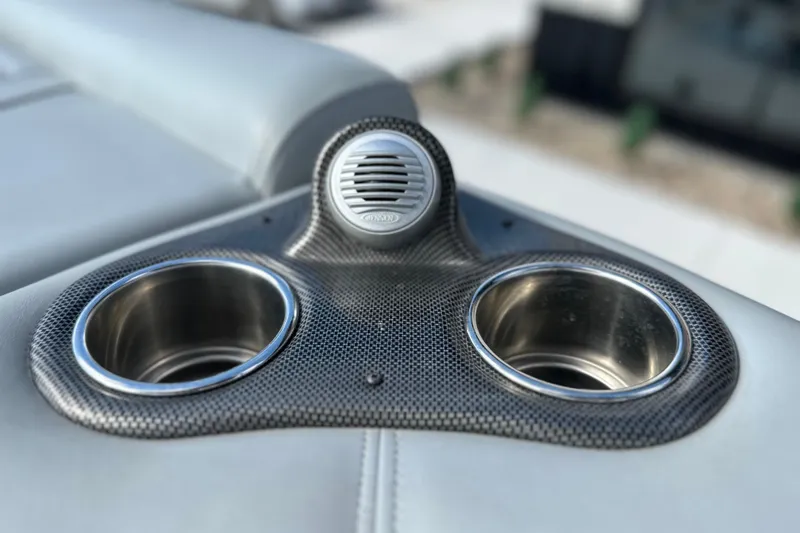 Slide: The Image of Stainless steel cup holders and speaker on 2011 South Bay 925 CR boat. - 22
