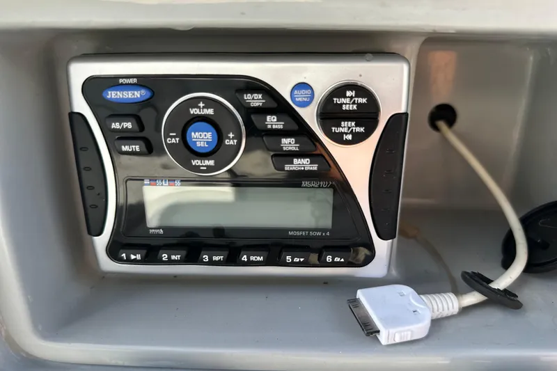 Slide: The Image of Jensen audio system in 2011 South Bay 925 CR boat with dock connector cable. - 26