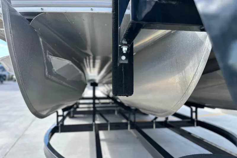 Slide: The Image of Close-up of 2011 South Bay 925 CR pontoon boat underside on trailer. - 9