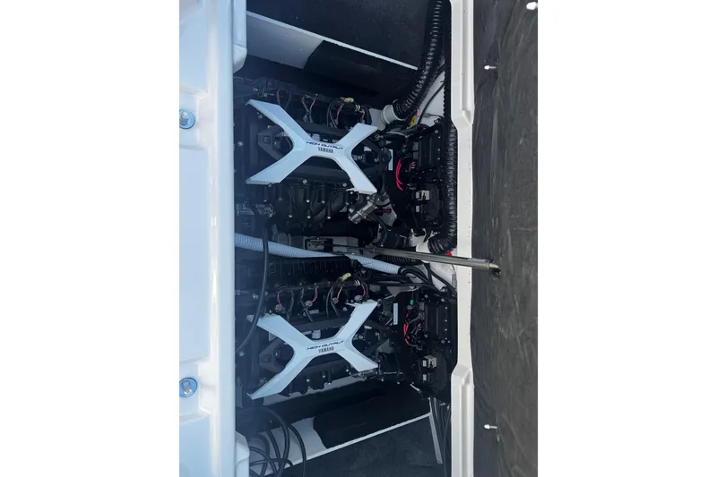 Slide: The Image of 2026 Yamaha Boat 222SE engine compartment showcasing dual engines and wiring. - 12