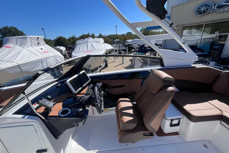 Slide: The Image of 2026 Yamaha Boat 222SE interior with modern dashboard and comfortable seating. - 7
