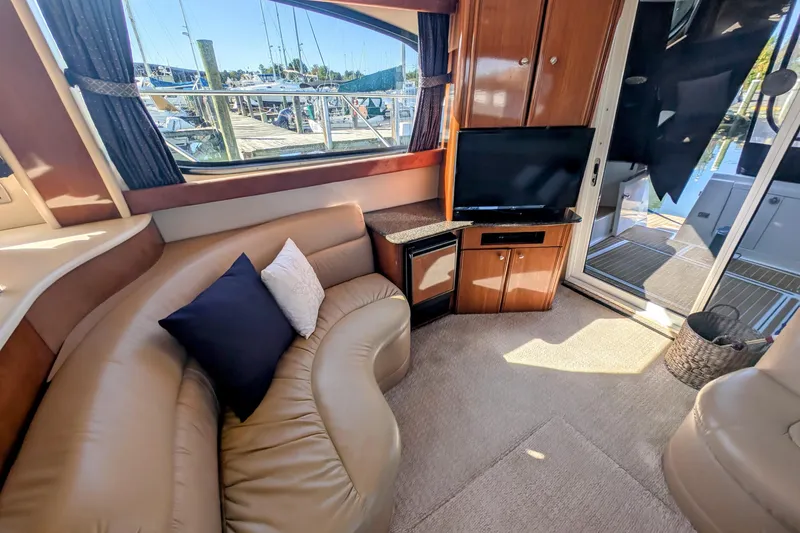 Slide: The Image of Interior of 2006 Meridian 411 Sedan yacht with leather seating and TV. - 10