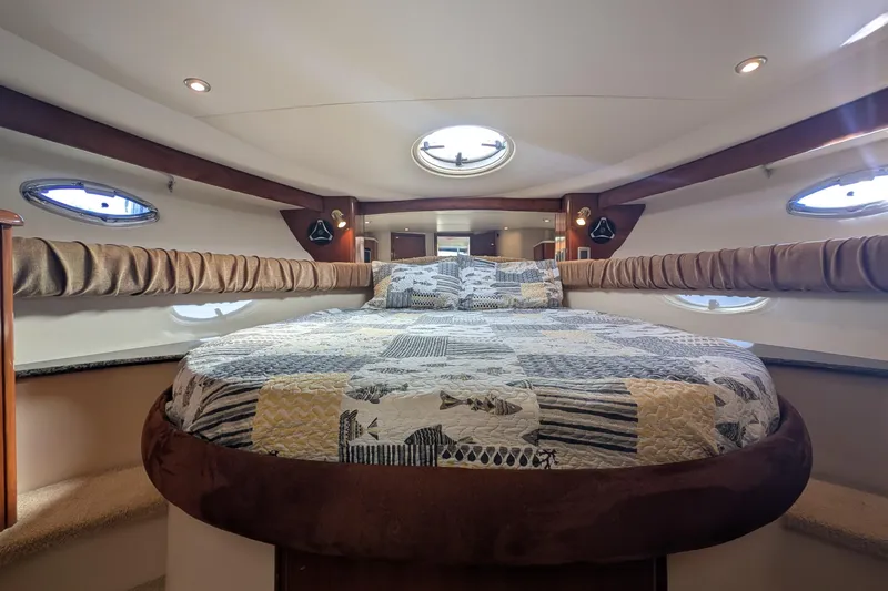 Slide: The Image of Luxurious interior of 2006 Meridian 411 Sedan yacht with cozy bed and elegant design. - 21