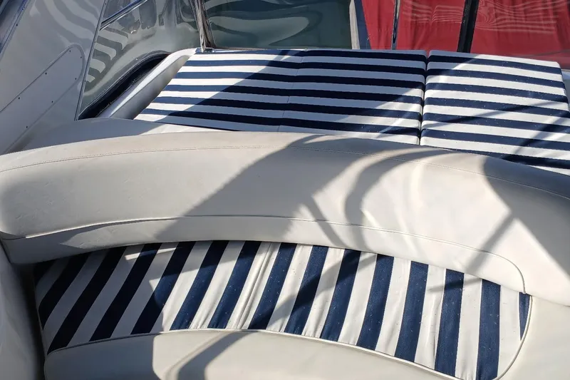 Slide: The Image of Luxury seating on 2006 Meridian 411 Sedan yacht with striped cushions. - 41