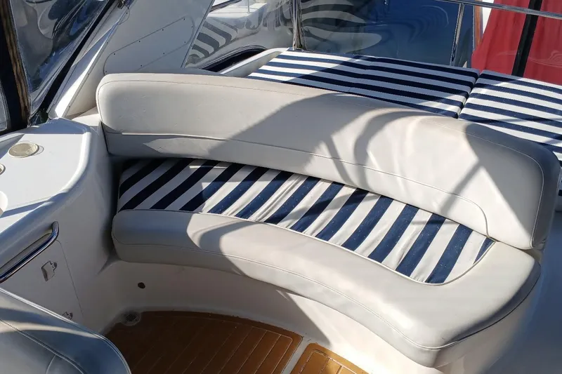 Slide: The Image of Luxury seating on 2006 Meridian 411 Sedan yacht with striped cushions. - 42