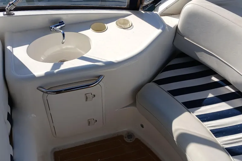 Slide: The Image of 2006 Meridian 411 Sedan interior with sink and striped seating. - 43