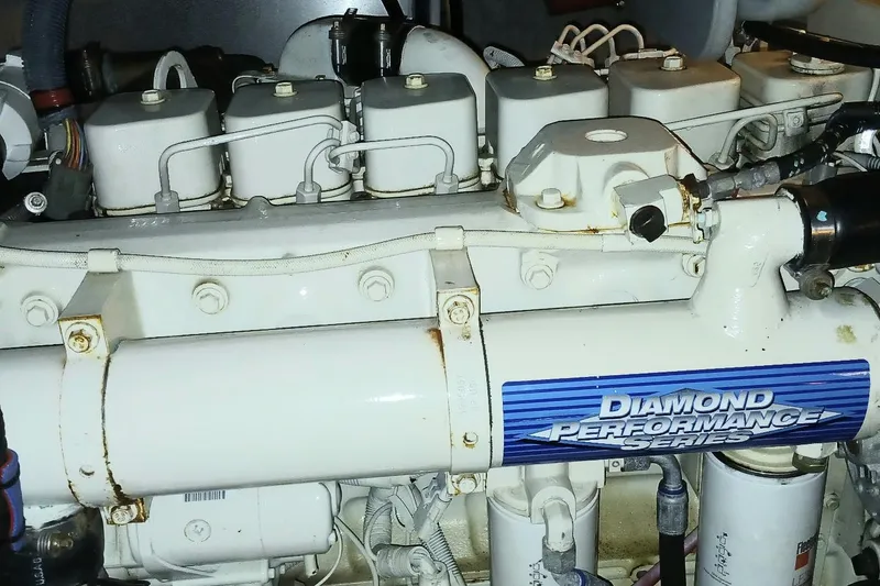 Slide: The Image of Engine of a 2006 Meridian 411 Sedan with Diamond Performance Series label. - 47