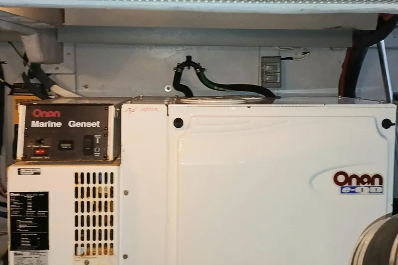Slide: The Image of Onan Marine Genset in 2006 Meridian 411 Sedan engine room. - 49