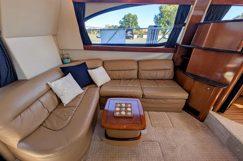 Slide: The Image of Luxurious interior of 2006 Meridian 411 Sedan yacht with leather seating and elegant decor. - 9