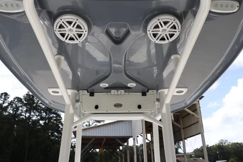 Slide: The Image of 2024 Tidewater 220 LXF boat underside with speakers and support structure. - 18