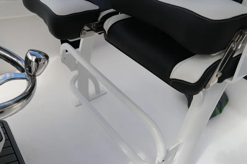 Slide: The Image of 2024 Tidewater 220 LXF boat seating and chrome detail. - 21