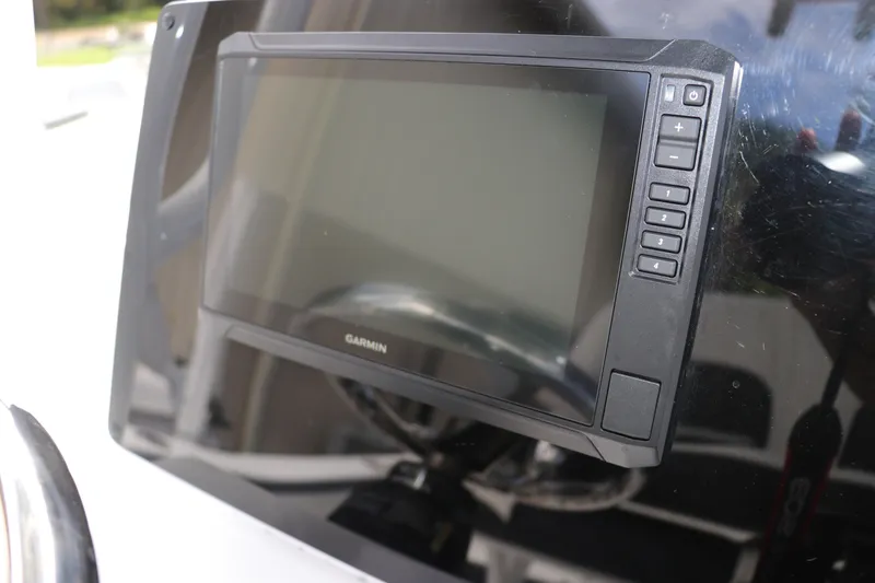 Slide: The Image of Garmin display on 2024 Tidewater 220 LXF boat dashboard. - 24
