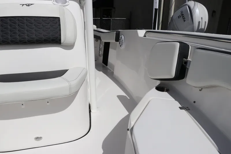 Slide: The Image of 2024 Tidewater 220 LXF boat interior with sleek seating and modern design. - 39