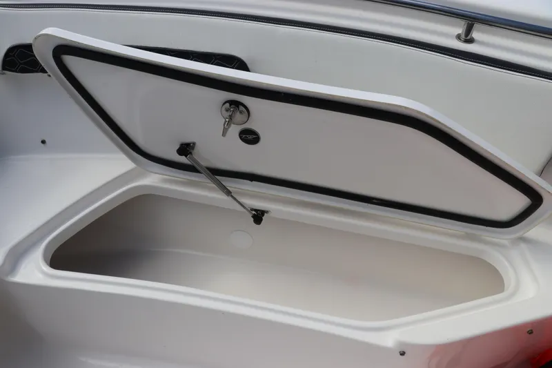 Slide: The Image of Open storage compartment on 2024 Tidewater 220 LXF boat. - 48