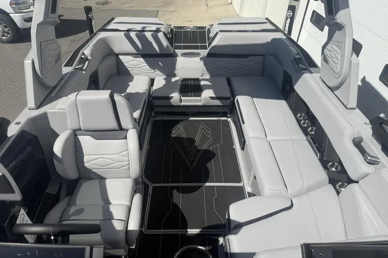 Slide: The Image of 2025 Supra SA 575 boat interior with luxurious seating and modern design. - 4