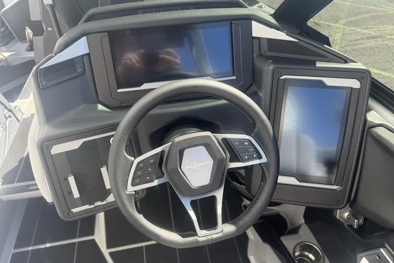 Slide: The Image of 2025 Supra SA 575 dashboard with modern steering wheel and dual touchscreens. - 6