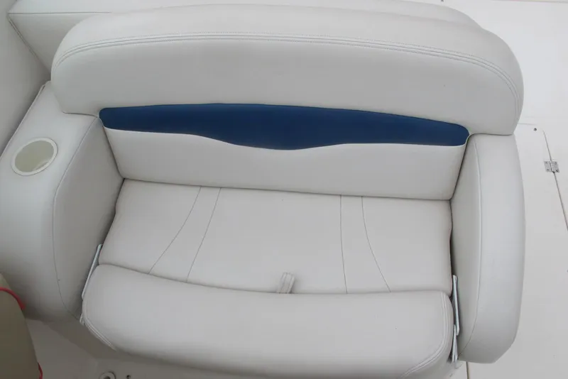 Slide: The Image of White and blue cushioned seat on 2003 Chaparral 280 SSi boat. - 8