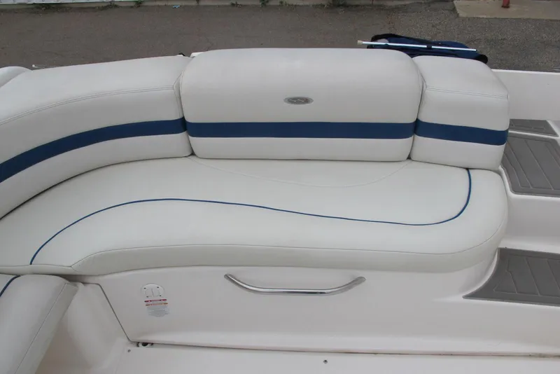 Slide: The Image of White and blue seating on 2003 Chaparral 280 SSi boat, featuring sleek design and comfortable upholstery. - 9