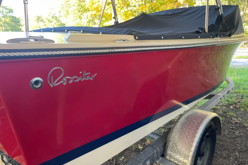 Slide: The Image of Red 2020 Rossiter 20 Coastal Cruiser boat on trailer, side view. - 3