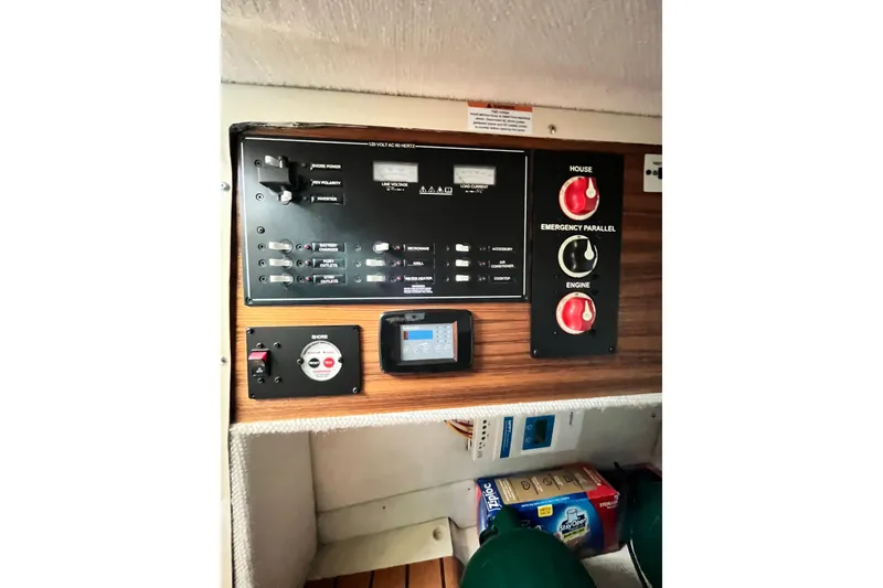 Slide: The Image of Electrical control panel of 2025 Ranger Tugs R23 boat with switches and gauges. - 37