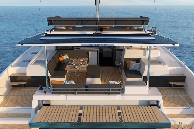 Slide: The Image of 2023 Fountaine Pajot Tanna 47 yacht side view with name and fender. - 2