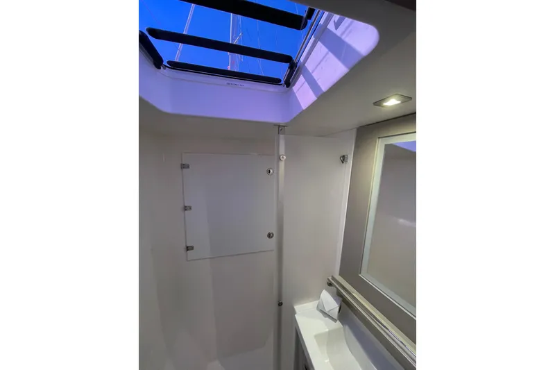 Slide: The Image of Modern bathroom interior of 2023 Fountaine Pajot Tanna 47 yacht with skylight. - 20