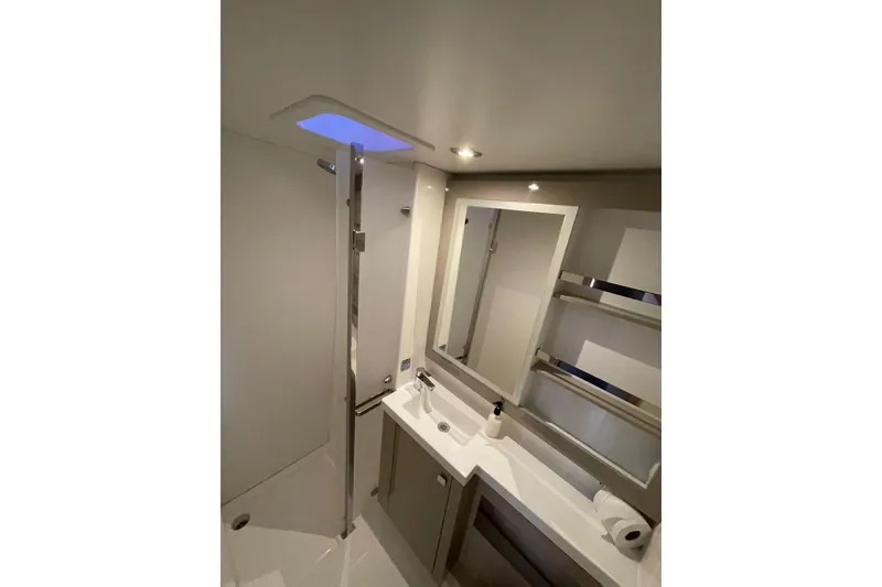 Slide: The Image of Modern bathroom interior of 2023 Fountaine Pajot Tanna 47 yacht, featuring sleek design and amenities. - 21