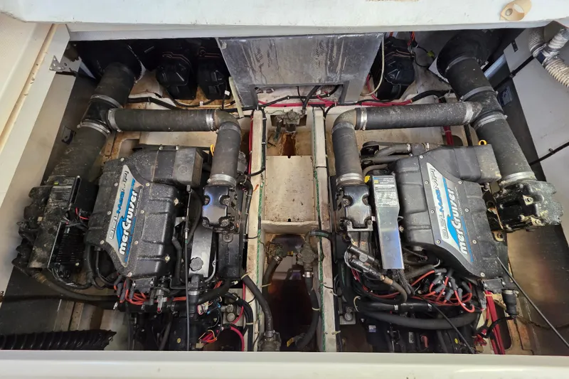 Slide: The Image of Engine compartment of a 1998 Maxum 3700 SCR with twin MerCruiser engines. - 52