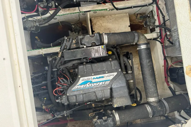 Slide: The Image of Engine compartment of a 1998 Maxum 3700 SCR with MerCruiser 8.2L MPI engine. - 56