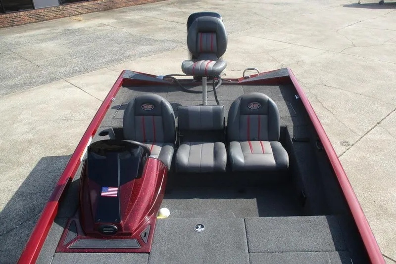 Slide: The Image of 2026 Ranger RT188 boat interior with gray and red seating, American flag detail. - 6