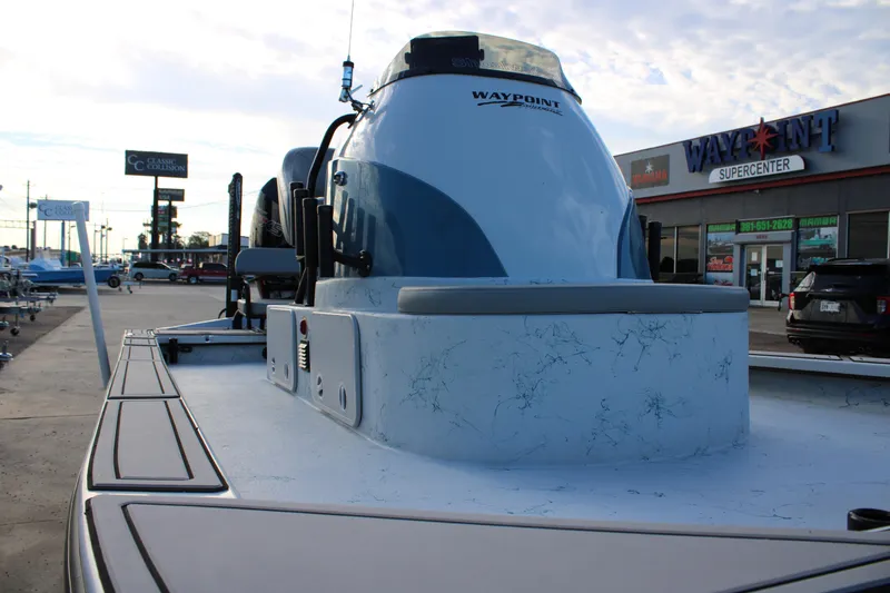 Slide: The Image of 2024 Shoalwater 23 Catamaran at dealership, showcasing sleek design and modern features. - 4