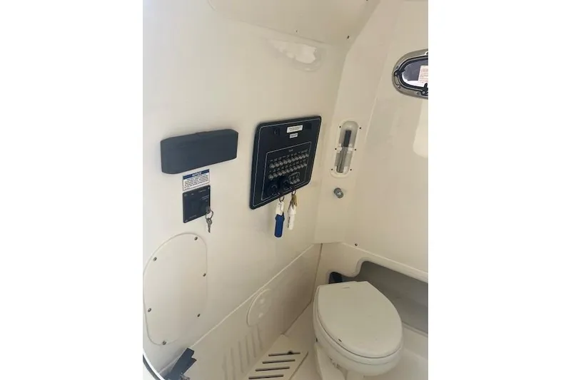 Slide: The Image of 2017 Boston Whaler 280 Outrage boat seats, beige upholstery, dual helm chairs. - 13