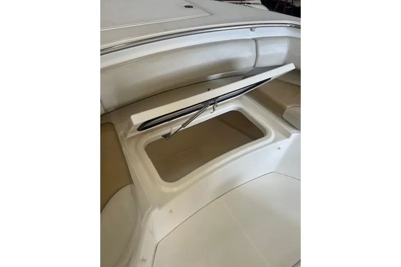 Slide: The Image of 2017 Boston Whaler 280 Outrage helm with Raymarine electronics and steering wheel. - 14