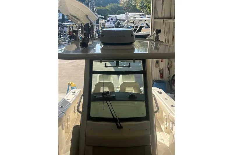 Slide: The Image of Open storage compartment on 2017 Boston Whaler 280 Outrage boat. - 18