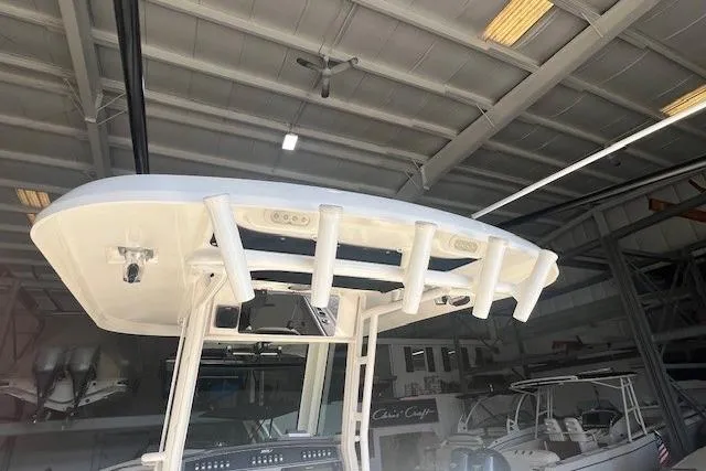 Slide: The Image of Anchor compartment of 2017 Boston Whaler 280 Outrage boat, featuring chain and rope storage. - 20