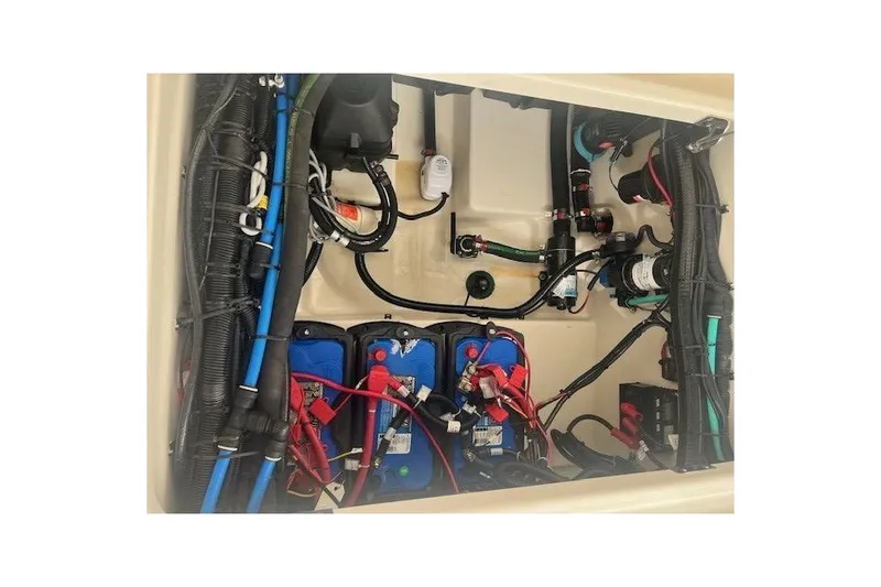 Slide: The Image of Interior view of a 2017 Boston Whaler 280 Outrage boat, featuring control panel and speaker. - 29