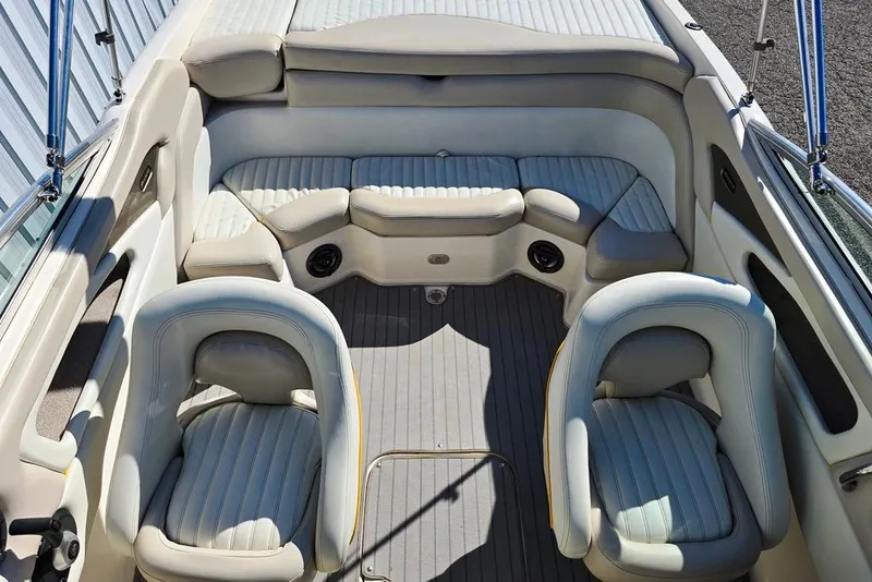 Slide: The Image of 2007 Bryant 219 BR boat interior with plush seating and modern design. - 5