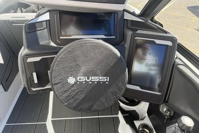 Slide: The Image of 2025 Supra SE 575 dashboard with Gussi Italia steering wheel and digital displays. - 10