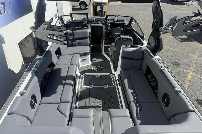 Slide: The Image of 2025 Supra SE 575 boat interior with luxurious seating and modern design. - 7