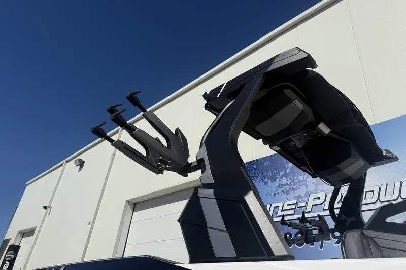 Slide: The Image of 2025 Supra SE 575 boat tower against a clear blue sky. - 8