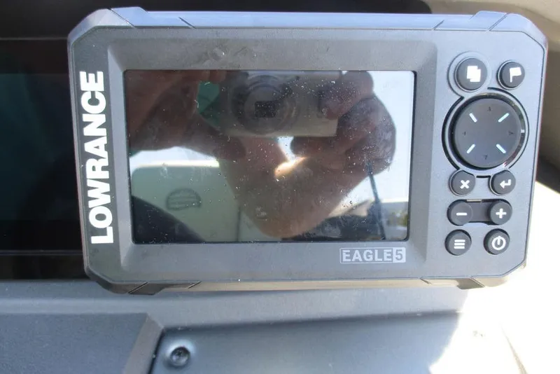 Slide: The Image of Lowrance Eagle 5 fish finder on 2026 Sun Tracker Fishin' Barge 20 DLX. - 2