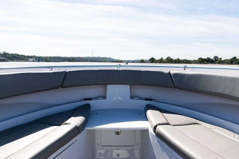 Slide: The Image of 2024 Sportsman Open 322 Center Console boat seating area with elegant upholstery. - 12