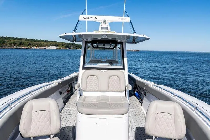 Slide: The Image of 2024 Sportsman Open 322 Center Console with Garmin radar on open water. - 15