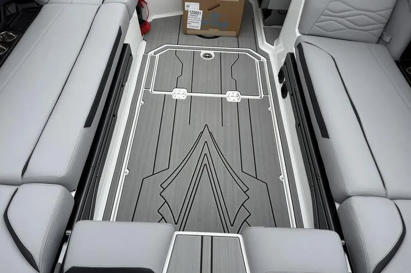 Slide: The Image of 2025 Supra SE 575 interior with sleek gray seating and stylish flooring design. - 10