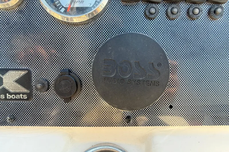 Slide: The Image of Dashboard of 2018 Xpress H20B Bay boat with Boss Audio Systems. - 66