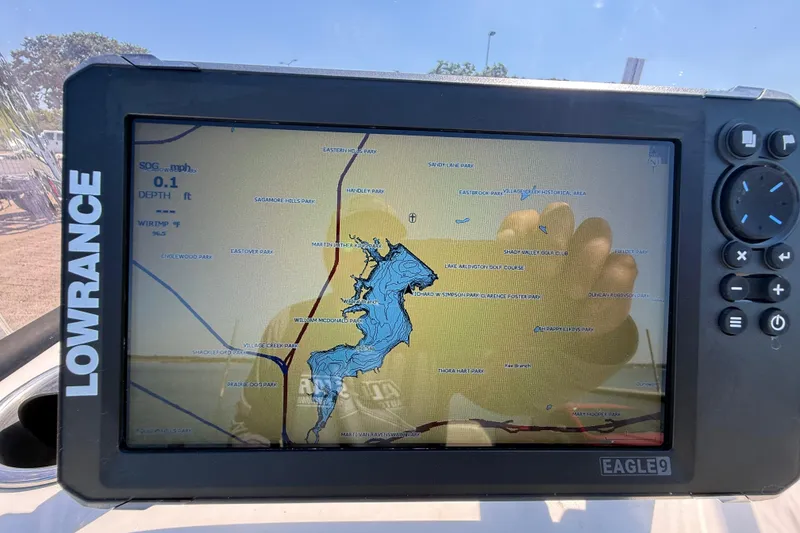 Slide: The Image of Lowrance GPS display on 2018 Xpress H20B Bay boat showing a detailed waterway map. - 67